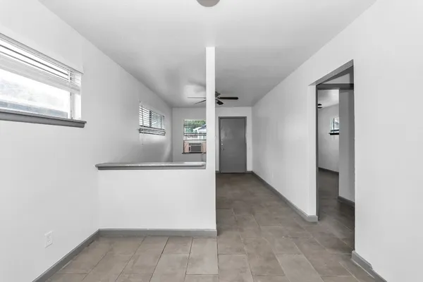 an empty room with windows