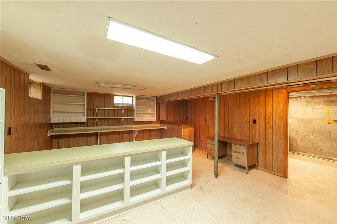27680 Dunford Road Westlake, OH 44145 - Photo 24 of 31 Bar featuring wood walls