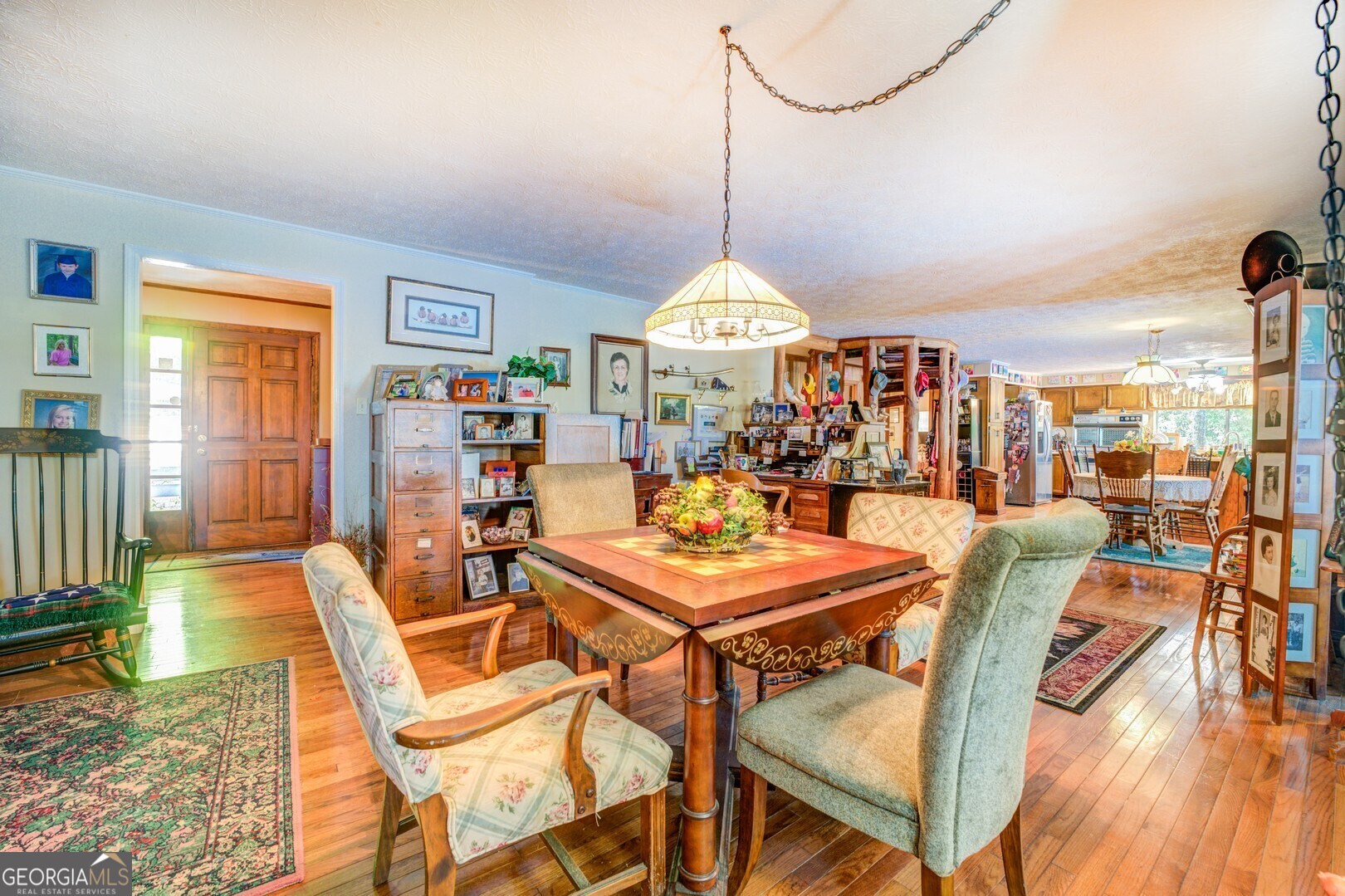 766 Raven Road Monticello, GA 31064 - Photo 28 of 59 a view of a dining room with furniture window and wooden floor