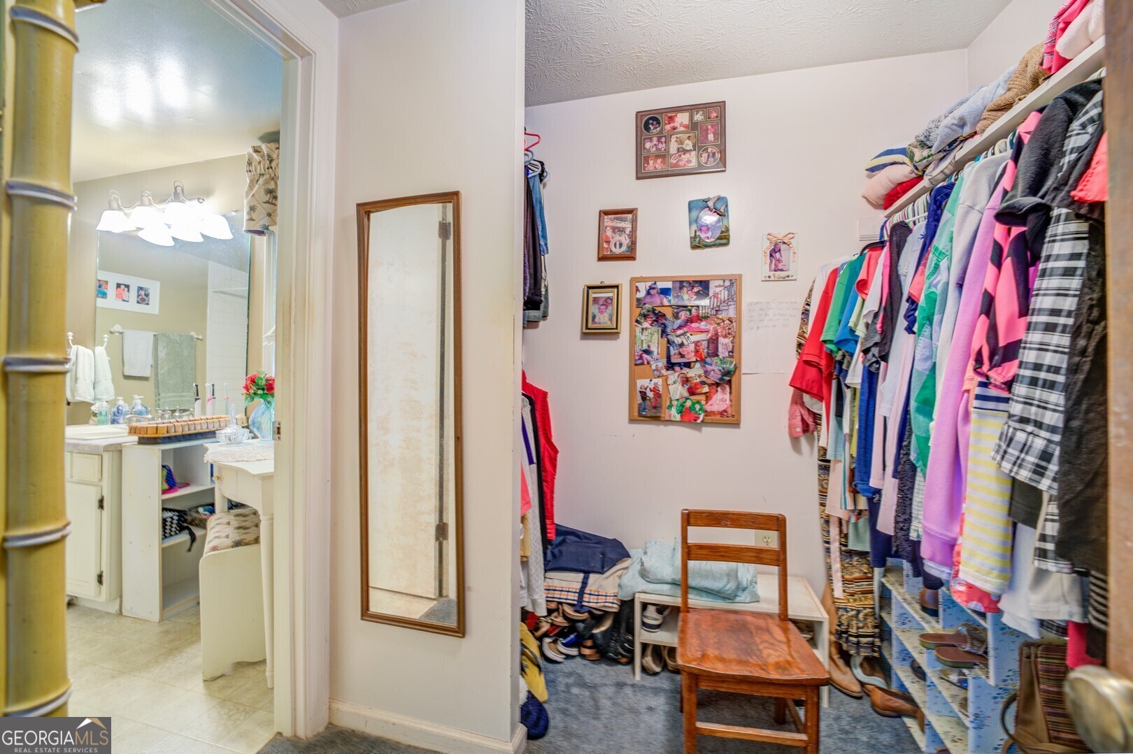 766 Raven Road Monticello, GA 31064 - Photo 44 of 59 a view of walk in closet with clothes and shoes