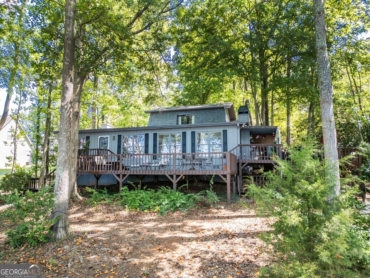 766 Raven Road Monticello, GA 31064 - Photo 54 of 59 a front view of a house with garden