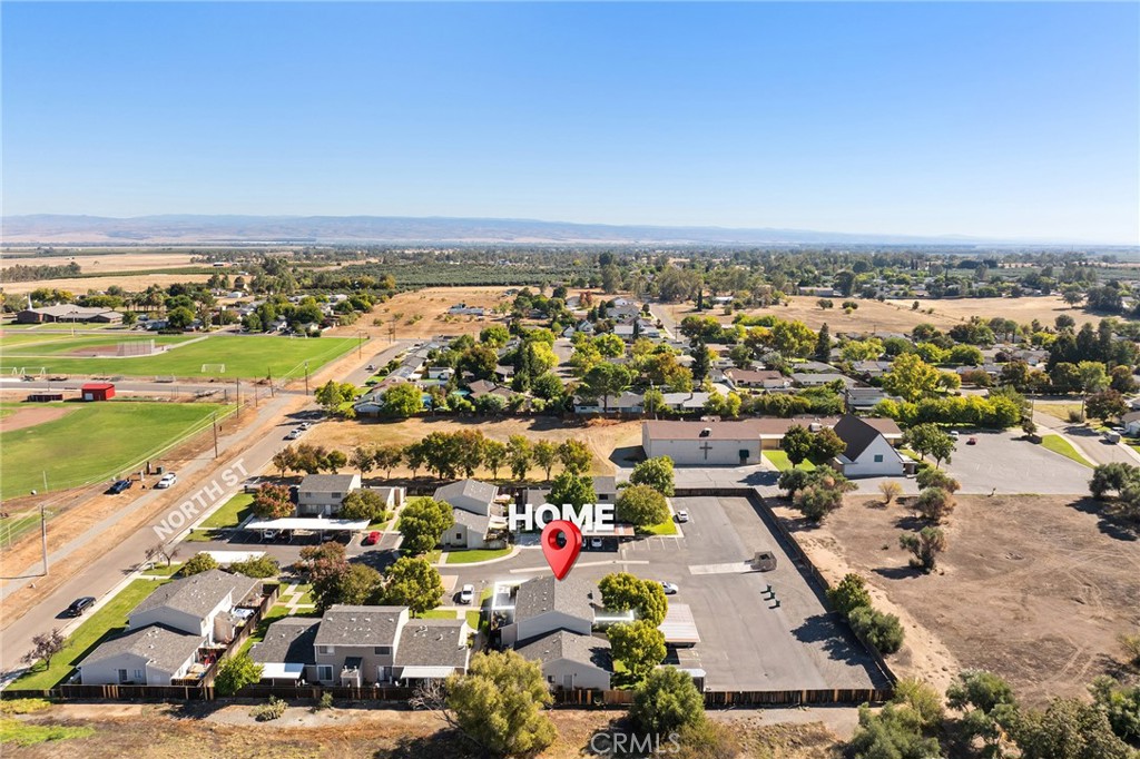 631 North Street Corning, CA 96021 - Photo 24 of 39 an aerial view of residential building and lake