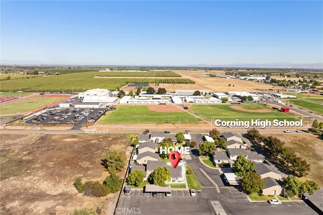 an aerial view of a city with lots of residential buildings