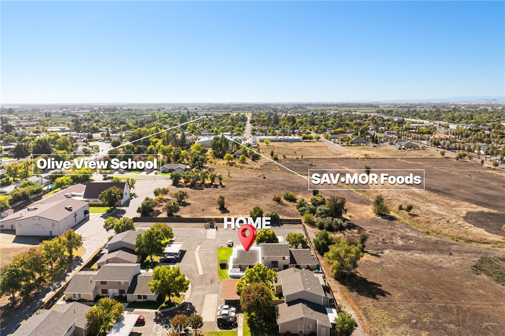 631 North Street Corning, CA 96021 - Photo 30 of 39 an aerial view of a city with lots of residential buildings