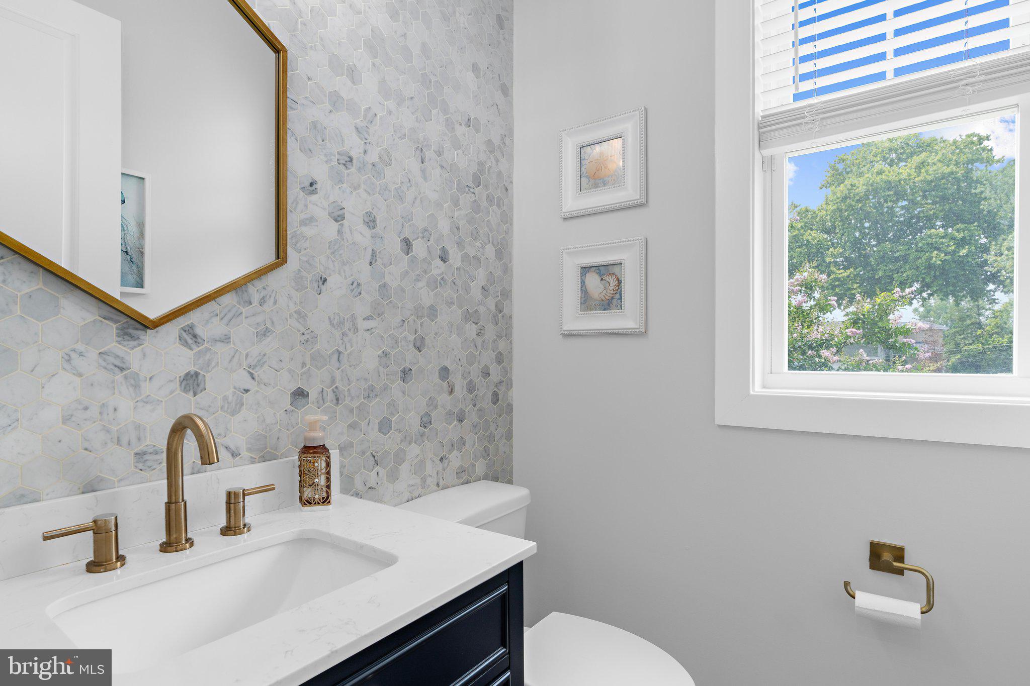 7429 Bay Front Road Sparrows Point, MD 21219 - Photo 13 of 86 Main floor powder room