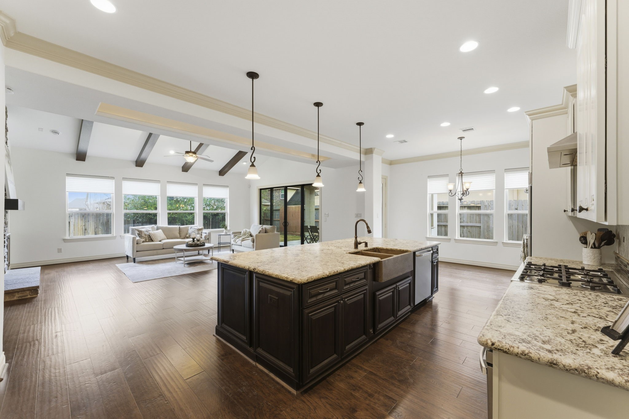 26006 Carolina Cherry Court Spring, TX 77389 - Photo 13 of 50 Step into the Gourmet Kitchen overlooking the Family Room