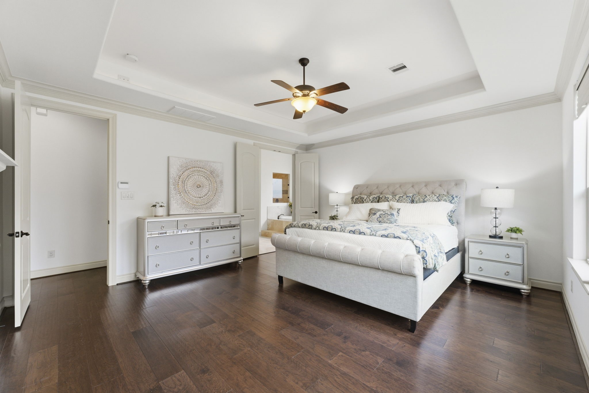 26006 Carolina Cherry Court Spring, TX 77389 - Photo 28 of 50 a room with a bed and a ceiling fan