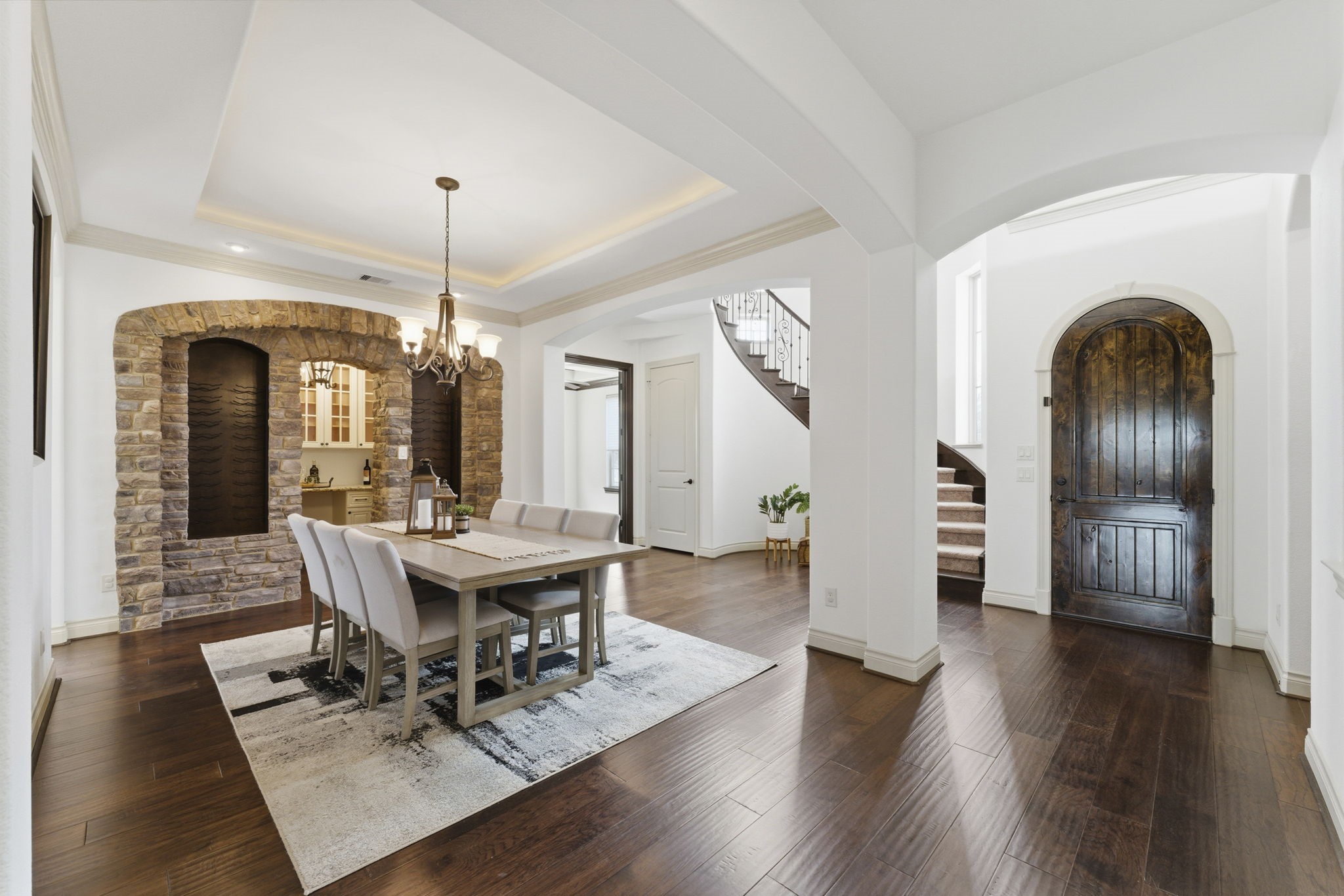 26006 Carolina Cherry Court Spring, TX 77389 - Photo 4 of 50 a view of a dining room with furniture window and wooden floor