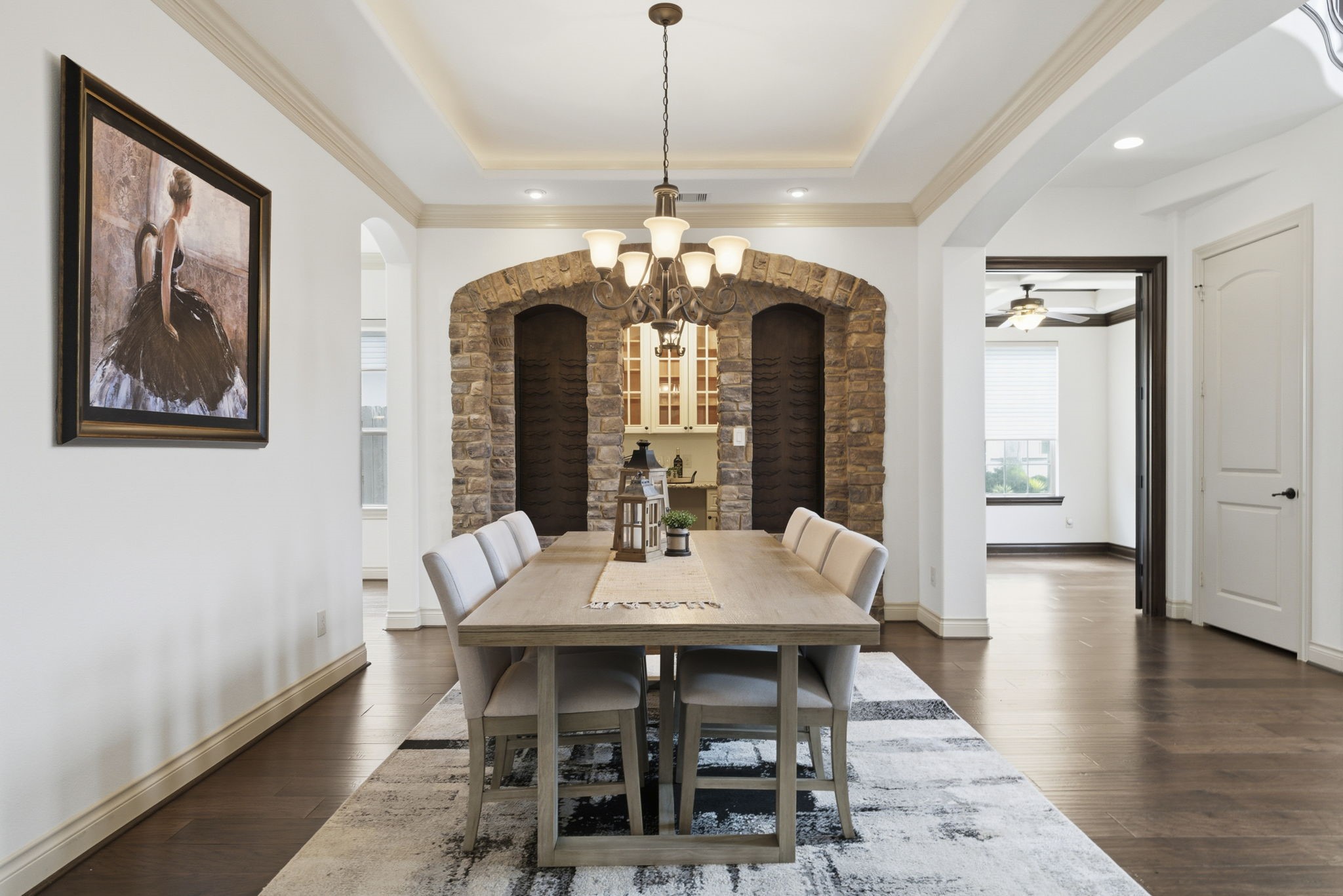26006 Carolina Cherry Court Spring, TX 77389 - Photo 8 of 50 a view of a dining room with furniture window and wooden floor
