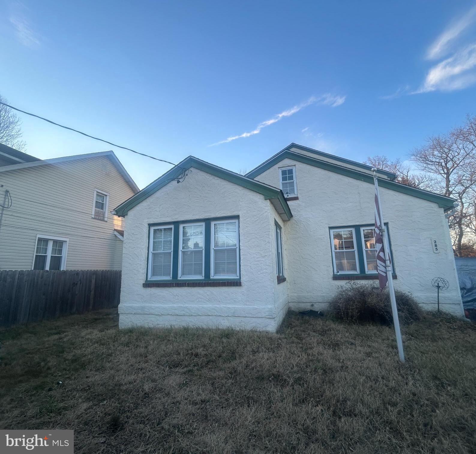 front view of a house with yard