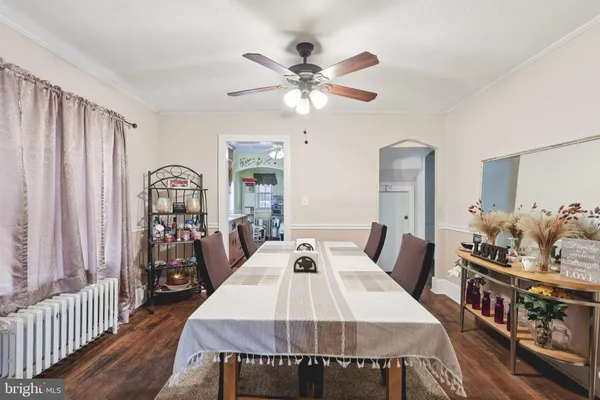 a very nice looking dining room with a table and chairs
