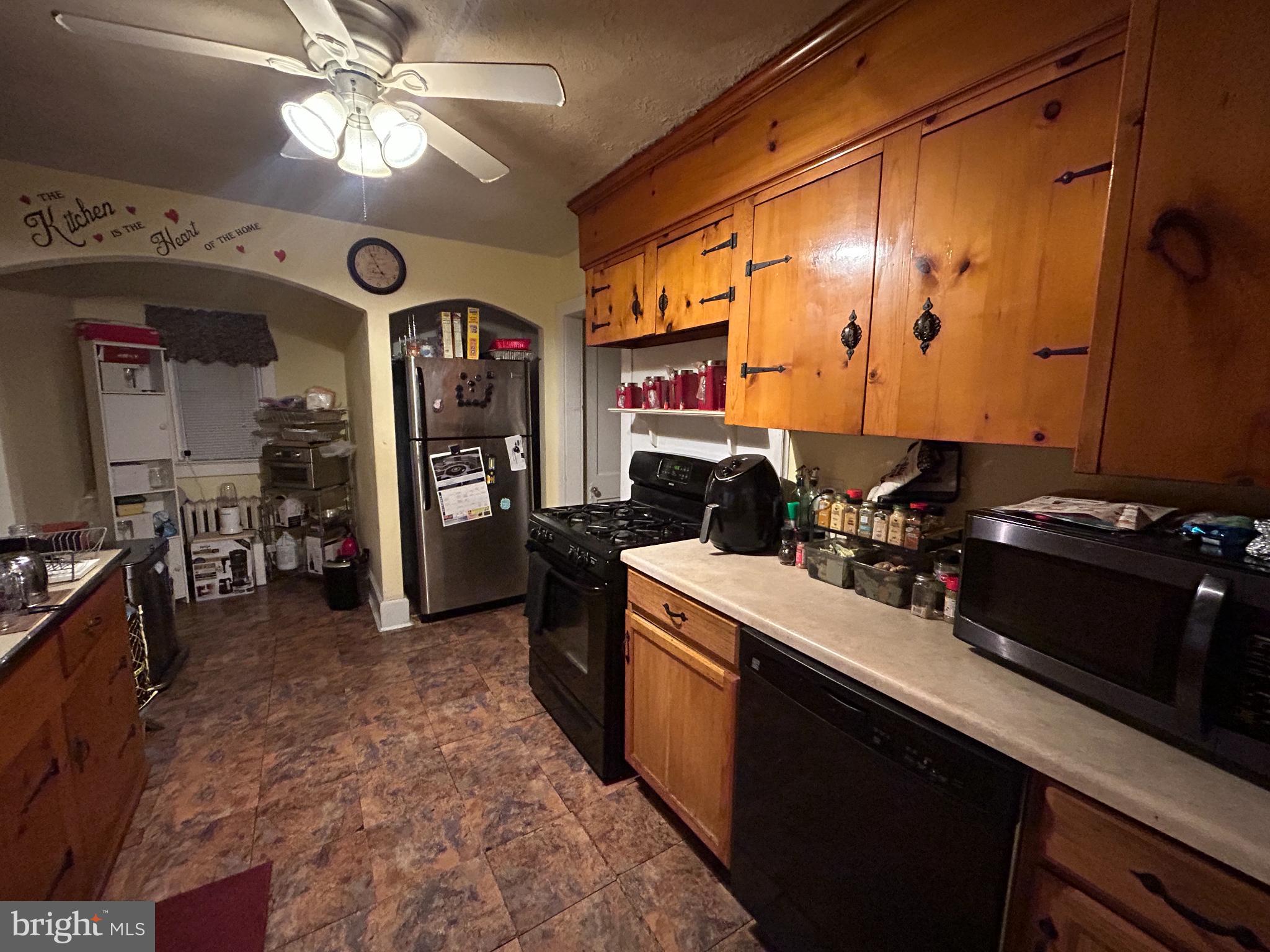 285 Watson Avenue Hamilton, NJ 08610 - Photo 9 of 11 a kitchen with stainless steel appliances a sink stove and refrigerator