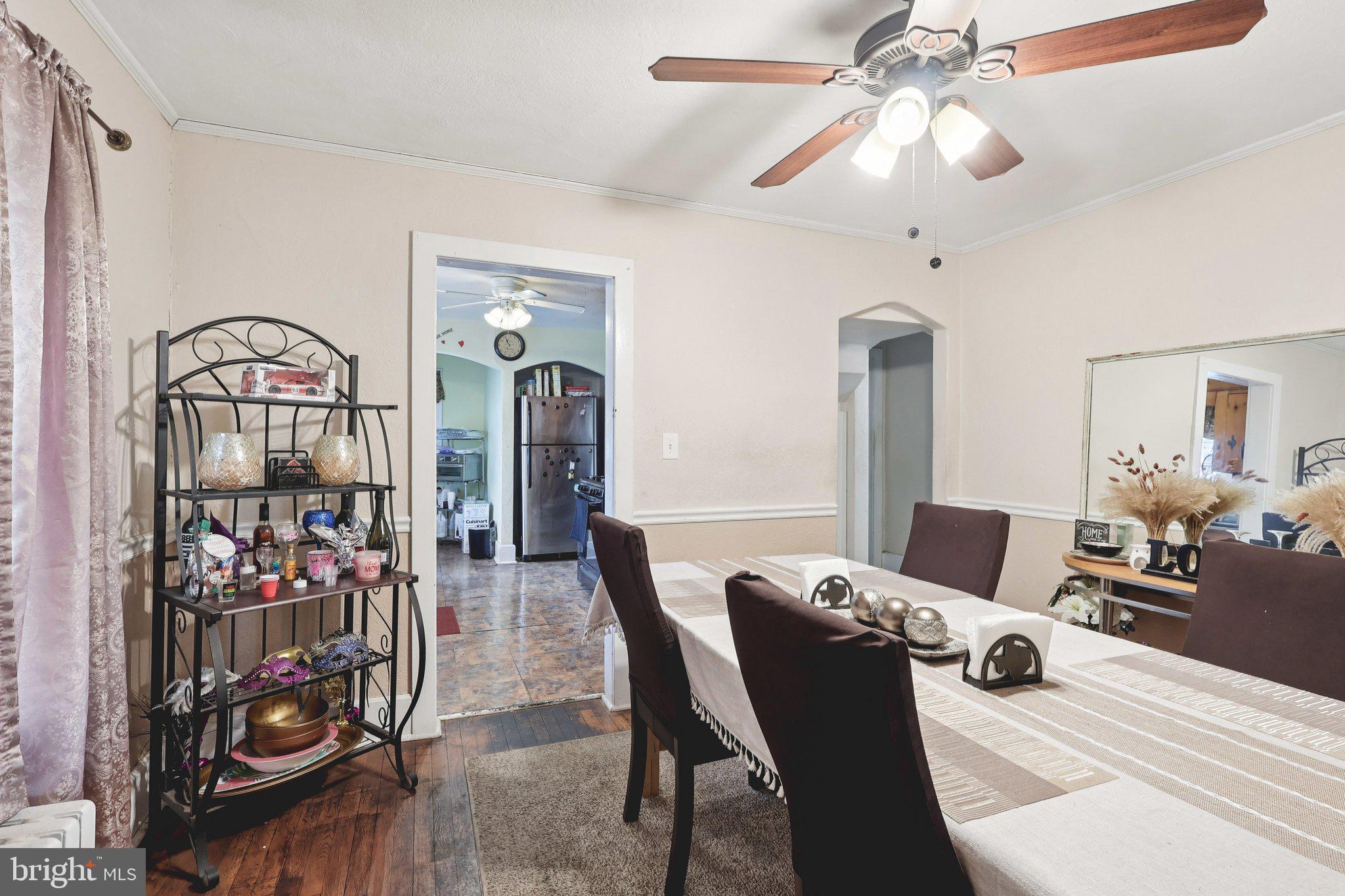 285 Watson Avenue Hamilton, NJ 08610 - Photo 9 of 18 a dining room with furniture and wooden floor