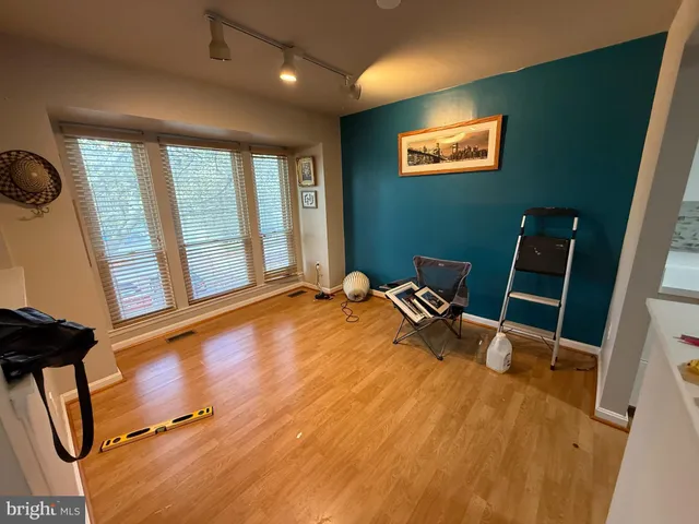 a bed room with a bed and furniture