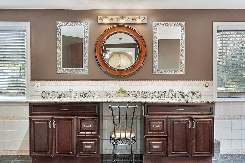 24 Powers Road Andover, MA 01810 - Photo 21 of 42 a bathroom with a sink and a mirror