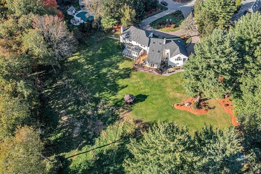 24 Powers Road Andover, MA 01810 - Photo 41 of 42 an aerial view of residential house with outdoor space and trees all around