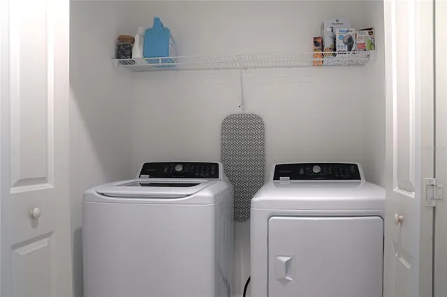 a utility room with dryer and washer