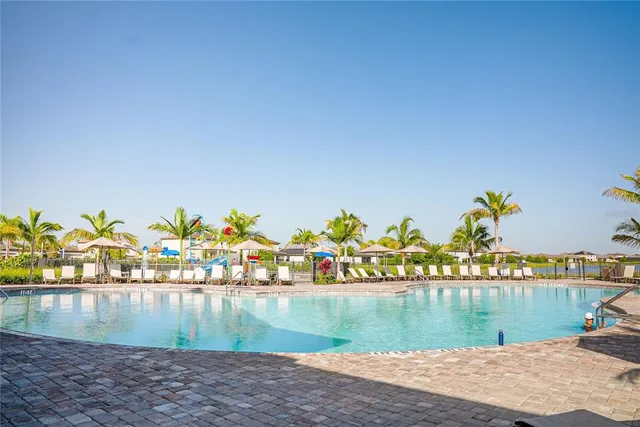 a view of swimming pool and lake