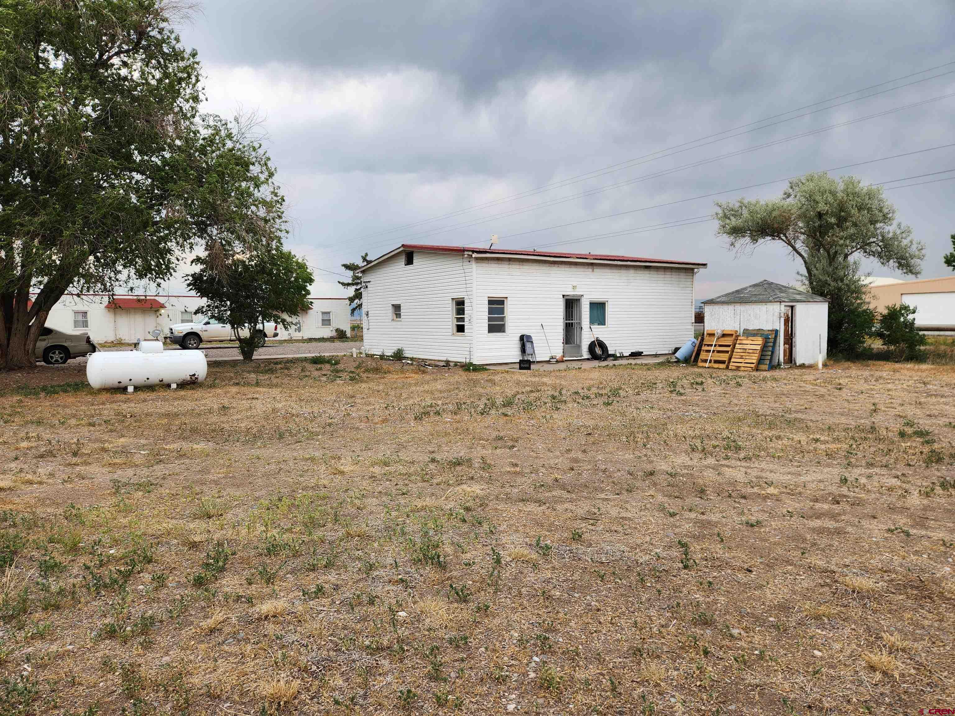 11977 US Highway 285 Center, CO 81125 - Photo 14 of 16 a view of a house with backyard and sitting area