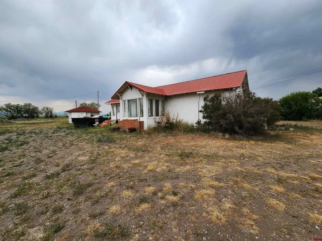 a house view with a garden space