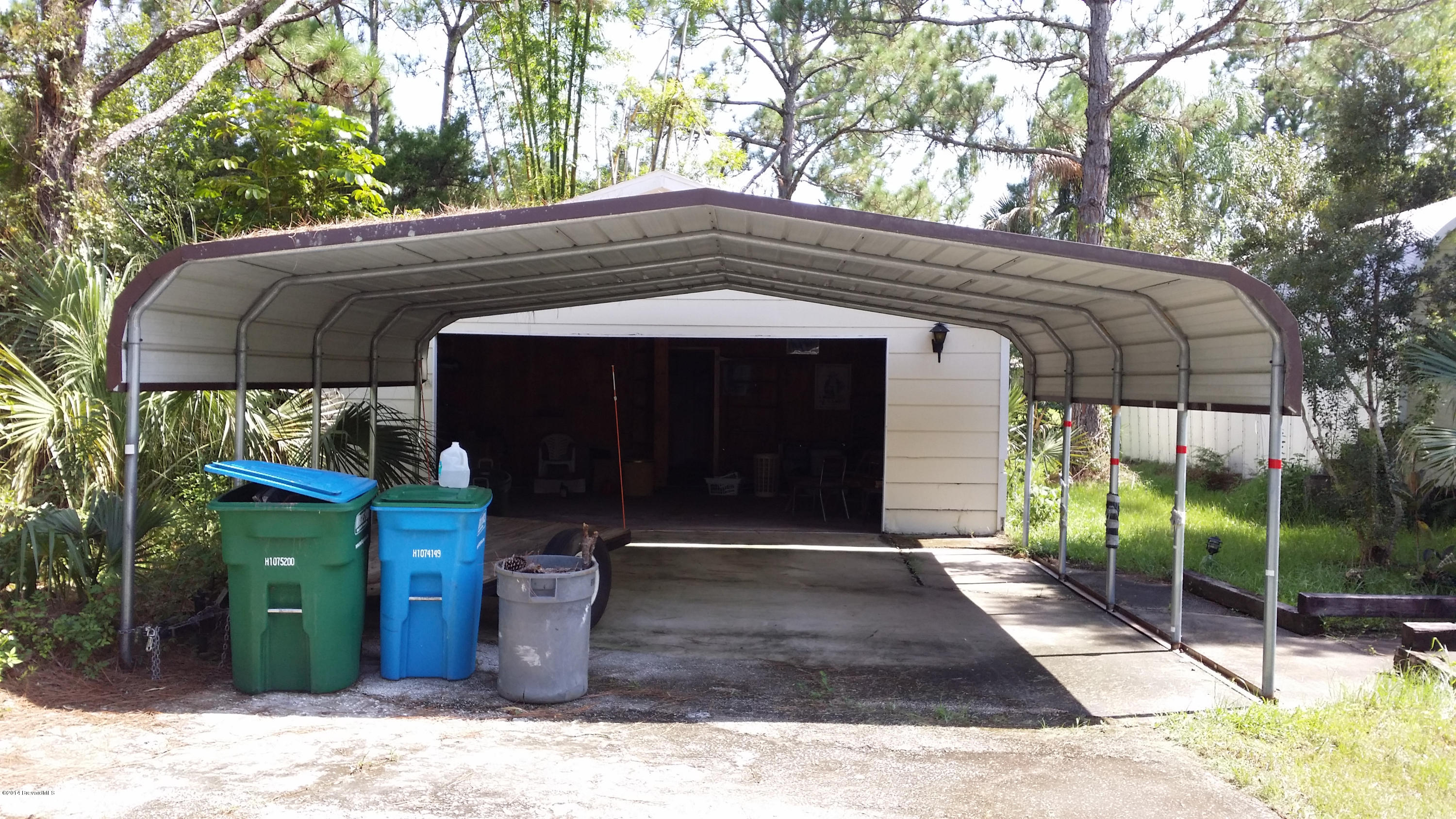 3800 Corey Road Grant Valkaria, FL 32950 - Photo 8 of 9 Carport