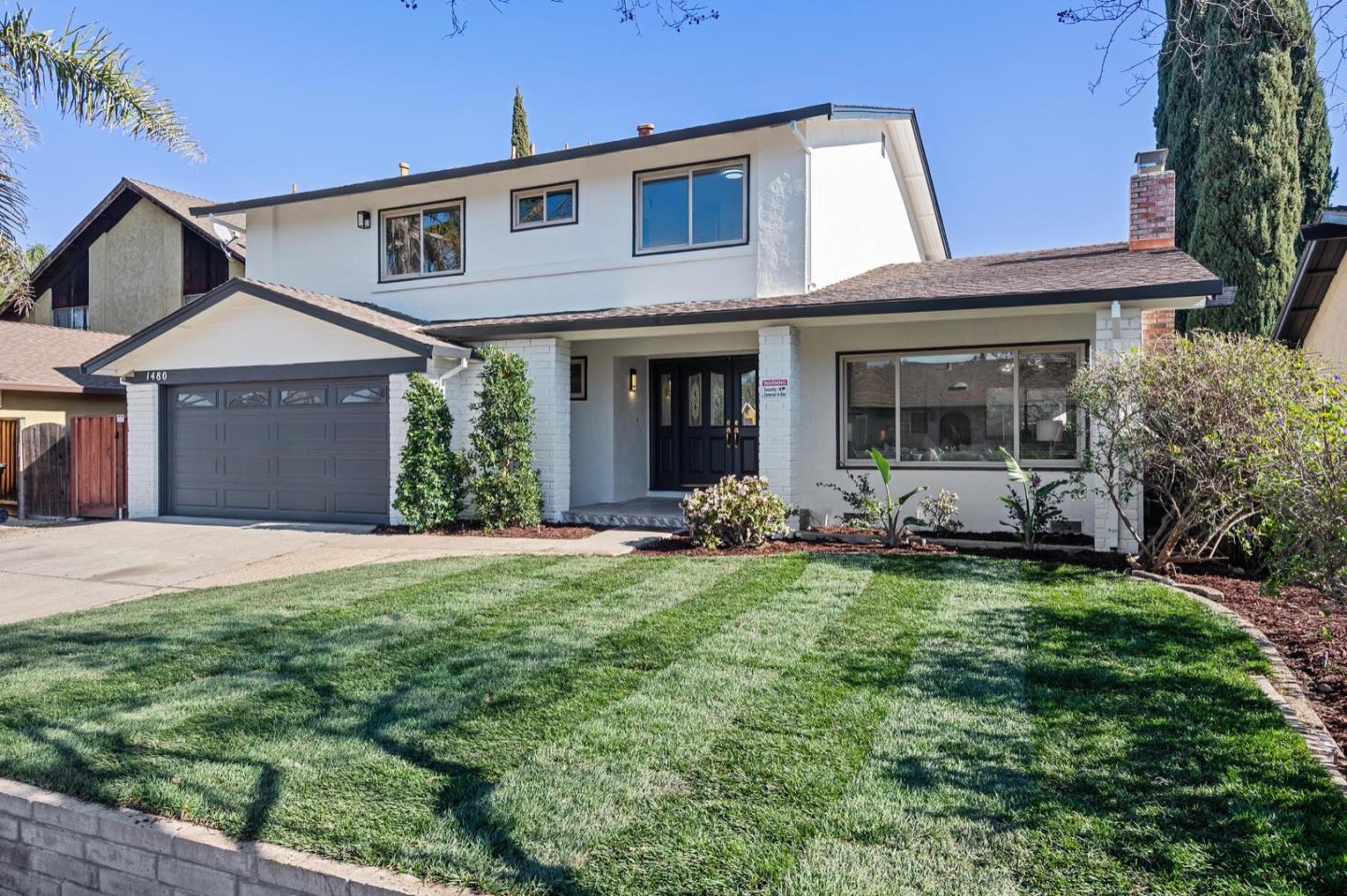 1480 Mallard Way Sunnyvale, CA 94087 - Photo 3 of 5 a front view of a house with a garden
