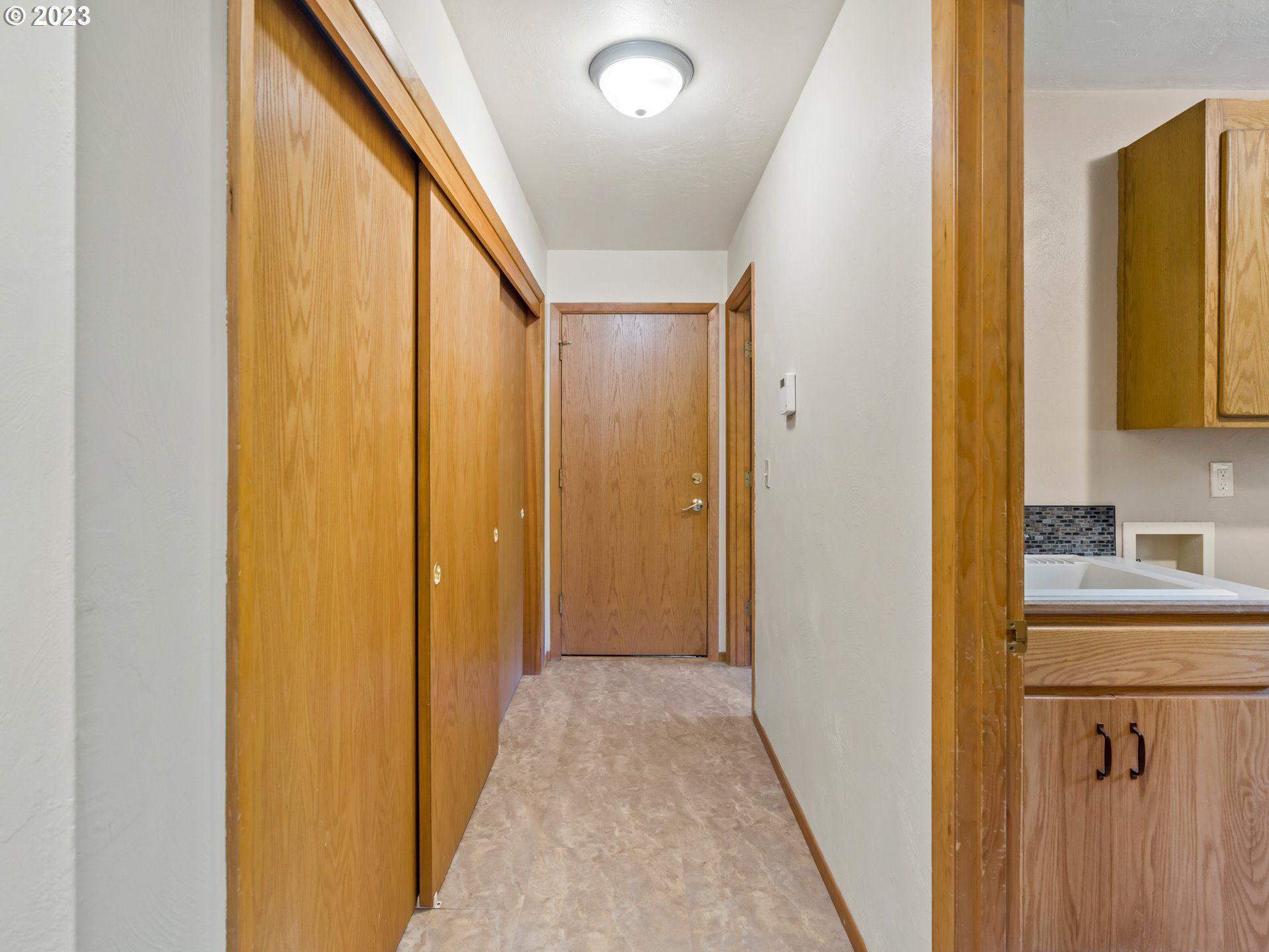 88601 Ermi Bee Road Springfield, OR 97478 - Photo 21 of 48 a view of a hallway with wooden floor and staircase