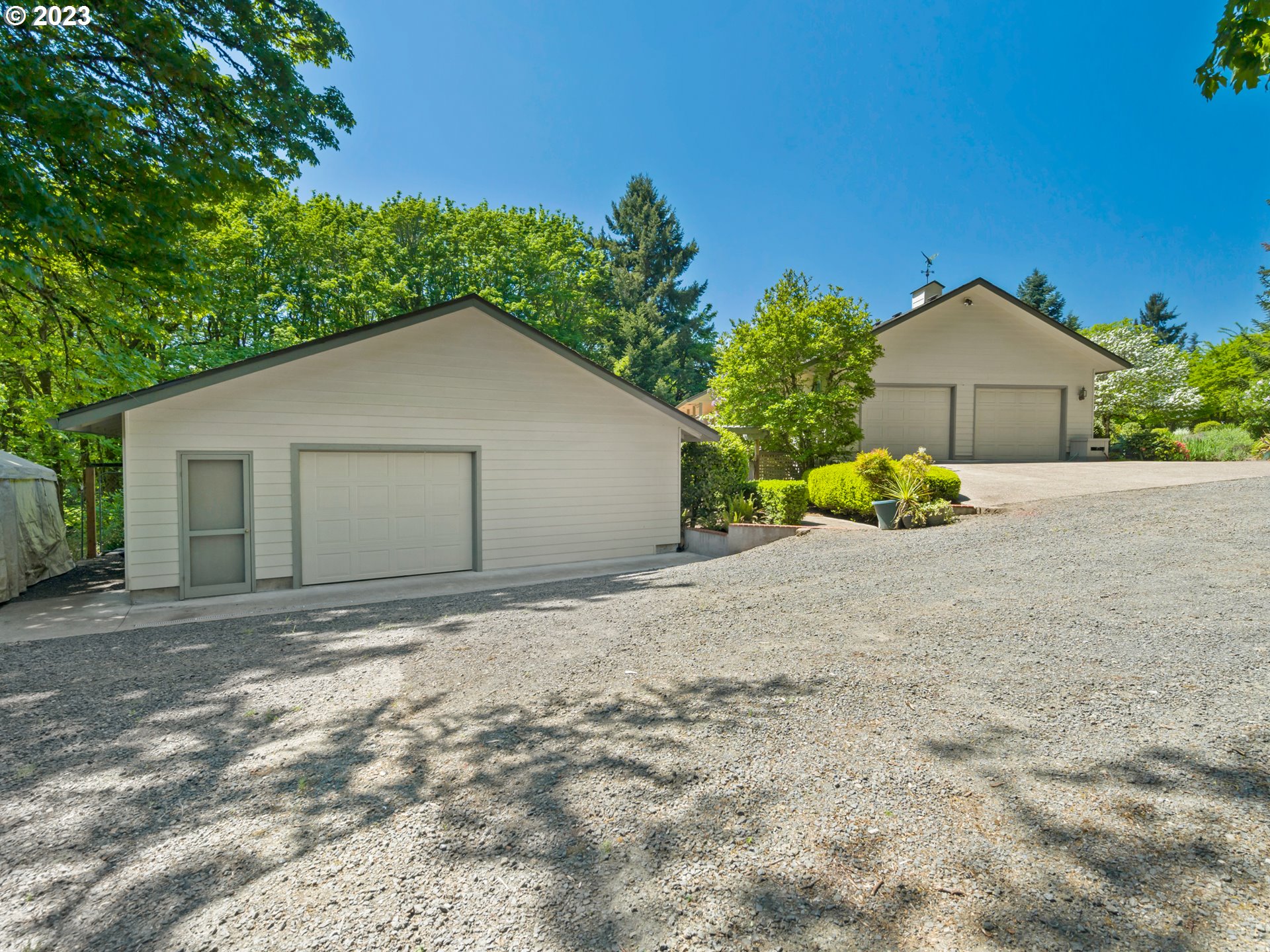 88601 Ermi Bee Road Springfield, OR 97478 - Photo 3 of 48 a house with a yard and a large parking space