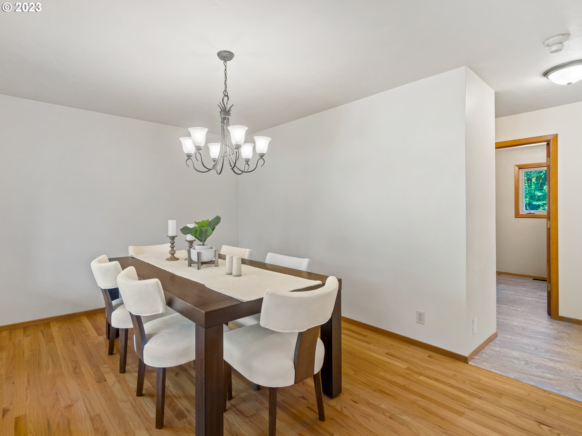 88601 Ermi Bee Road Springfield, OR 97478 - Photo 8 of 48 a view of a dining room with furniture and wooden floor