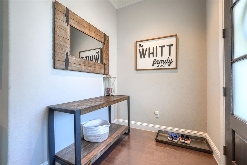 1436 Pebble Way Allen, TX 75013 - Photo 8 of 35 a view of room with window and wooden floor