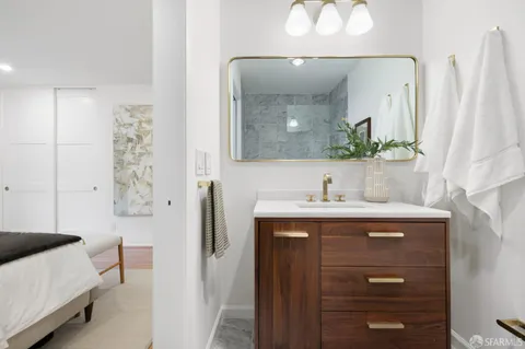 a bathroom with a sink and a mirror