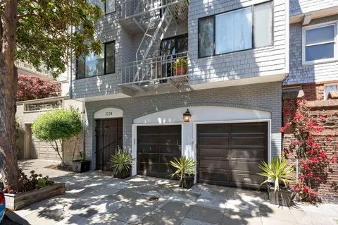 a front view of a house with yard