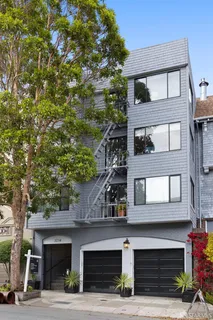 a front view of a building with road