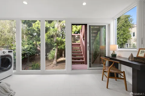 a room with furniture and a window