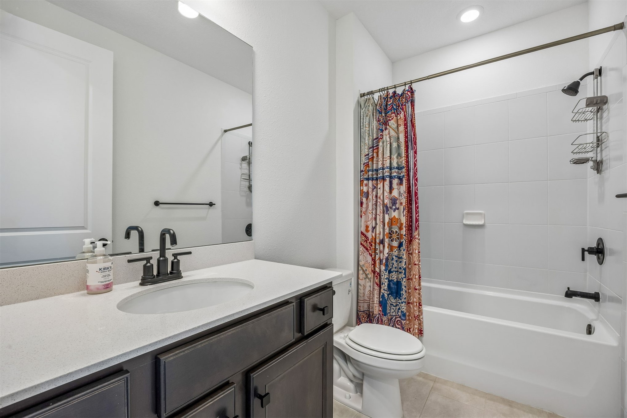 236 Hawthorn Park Circle Yulee, FL 32097 - Photo 13 of 28 a bathroom with a sink toilet and shower