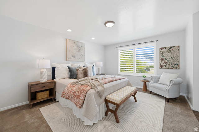 3732 Campbell Road Tooele, UT 84074 - Photo 29 of 69 Carpeted bedroom featuring white walls and a large window with white plantation shutters