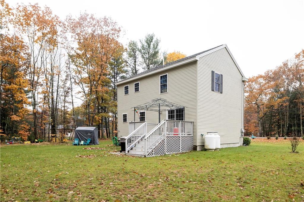 314 Thompson Road Arundel, ME 04046 - Photo 28 of 31 The deck leads to the backyard. Get...
