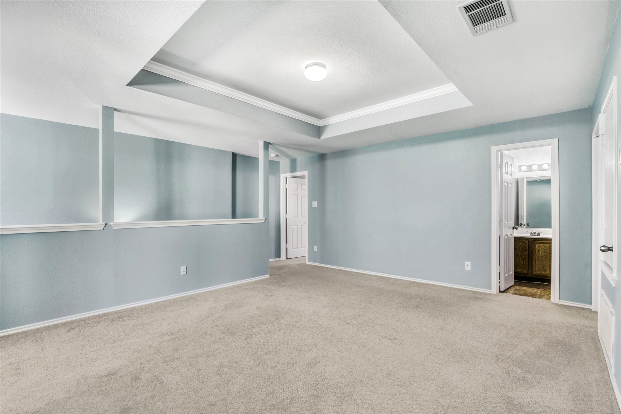 5624 Colinton Avenue Austin, TX 78754 - Photo 20 of 38 Upstairs Family Room with ornamental molding, carpet floors, and a raised ceiling