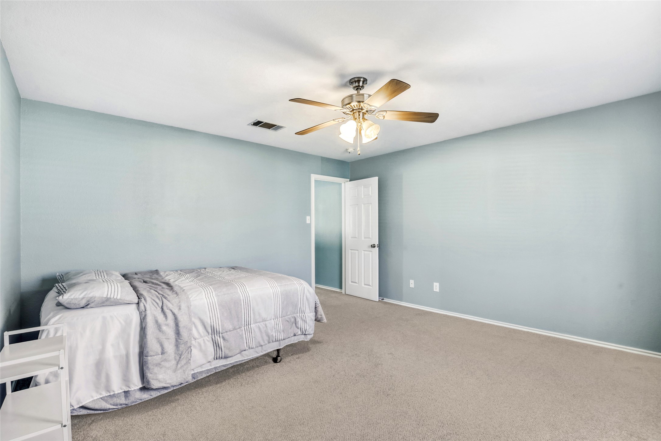 5624 Colinton Avenue Austin, TX 78754 - Photo 23 of 38 Primary Bedroom with carpet and a ceiling fan