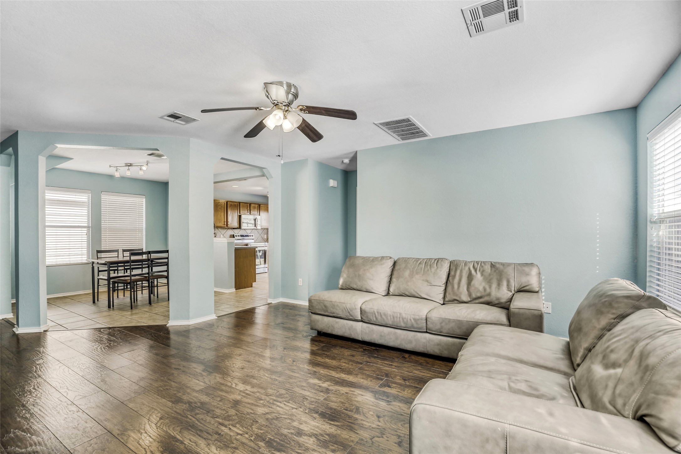 5624 Colinton Avenue Austin, TX 78754 - Photo 3 of 38 Living area featuring dark wood finished floors and ceiling fan