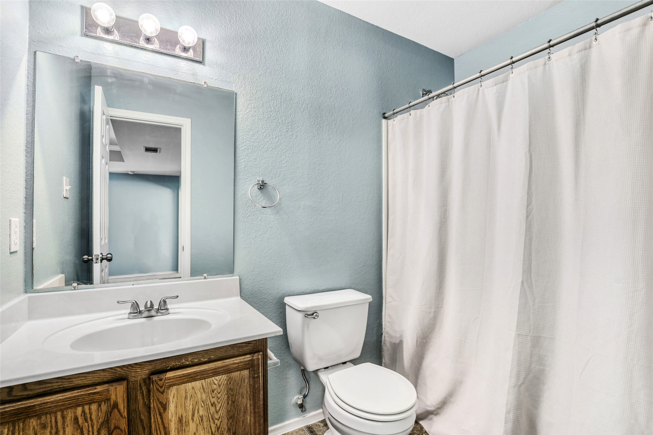 5624 Colinton Avenue Austin, TX 78754 - Photo 32 of 38 First Floor Full bathroom direct next to the downstairs bedroom #3