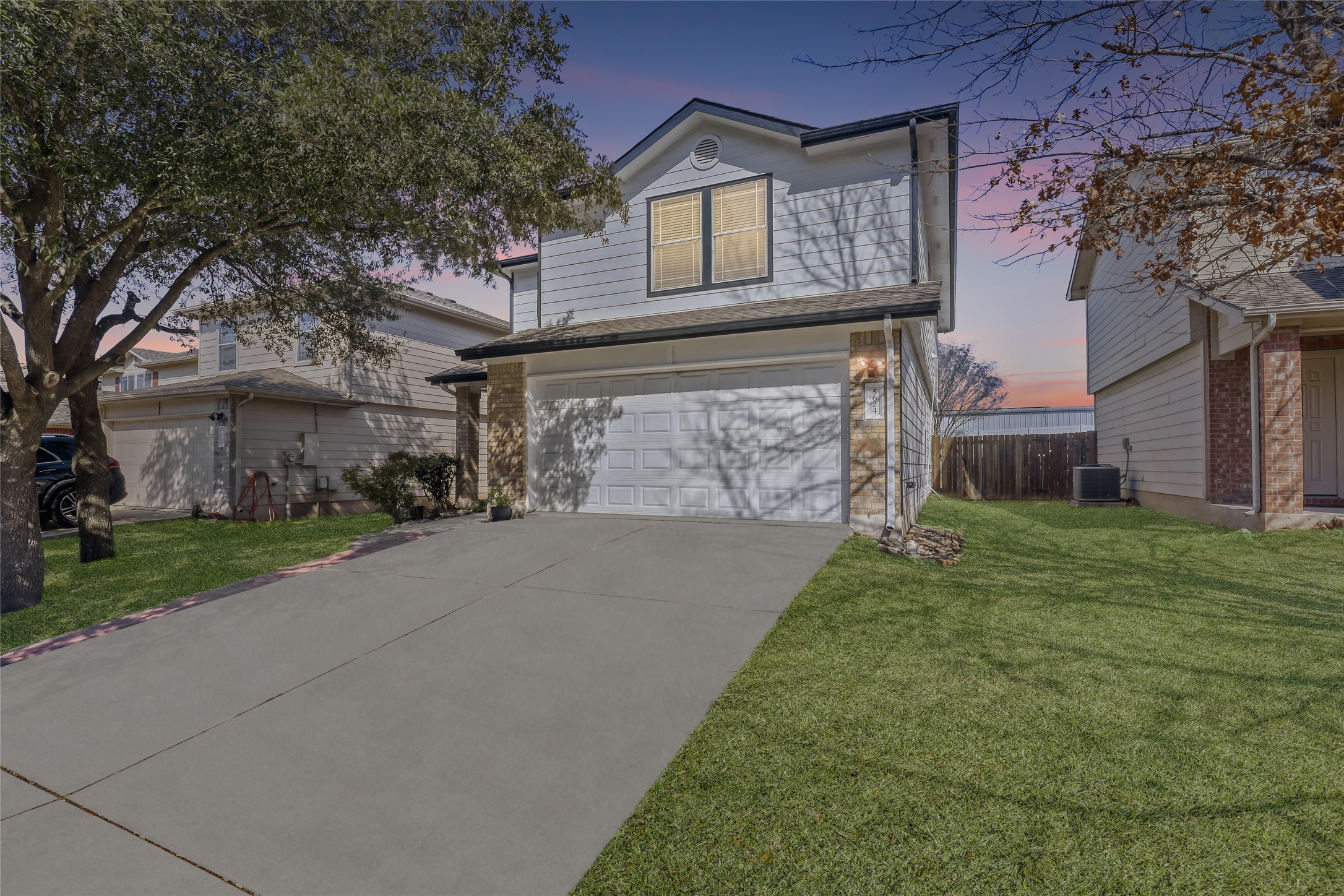 5624 Colinton Avenue Austin, TX 78754 - Photo 10 of 38 Traditional-style house with an attached garage and large driveway