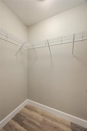 a view of a room with racks on the wall