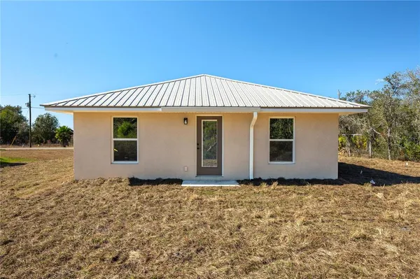 a front view of house with yard