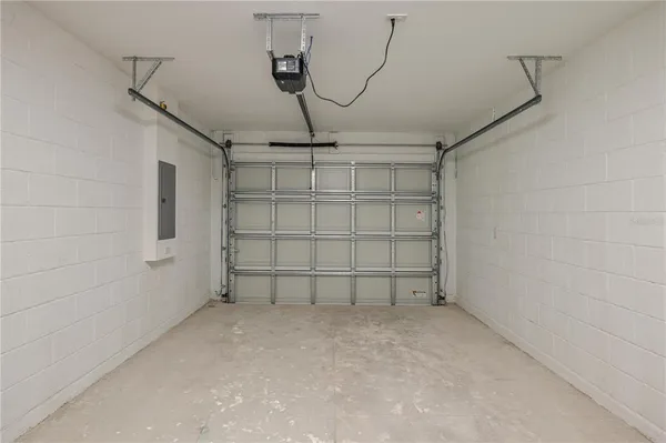 en empty room with chandelier