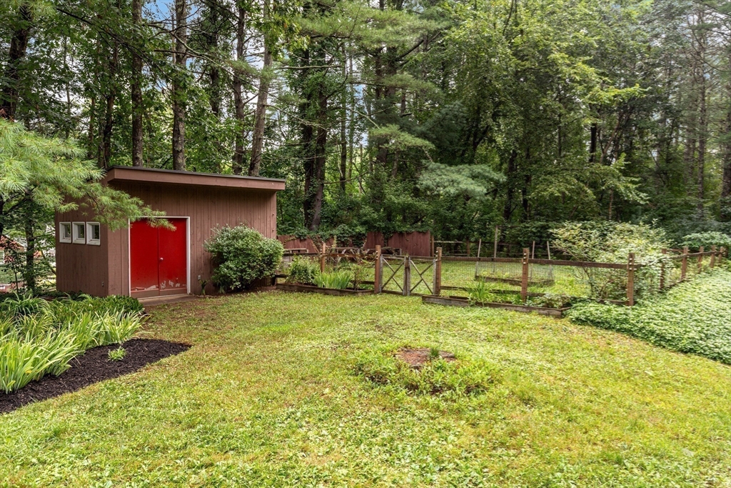 738 Lowell Road Groton, MA 01450 - Photo 21 of 30 a view of a back yard