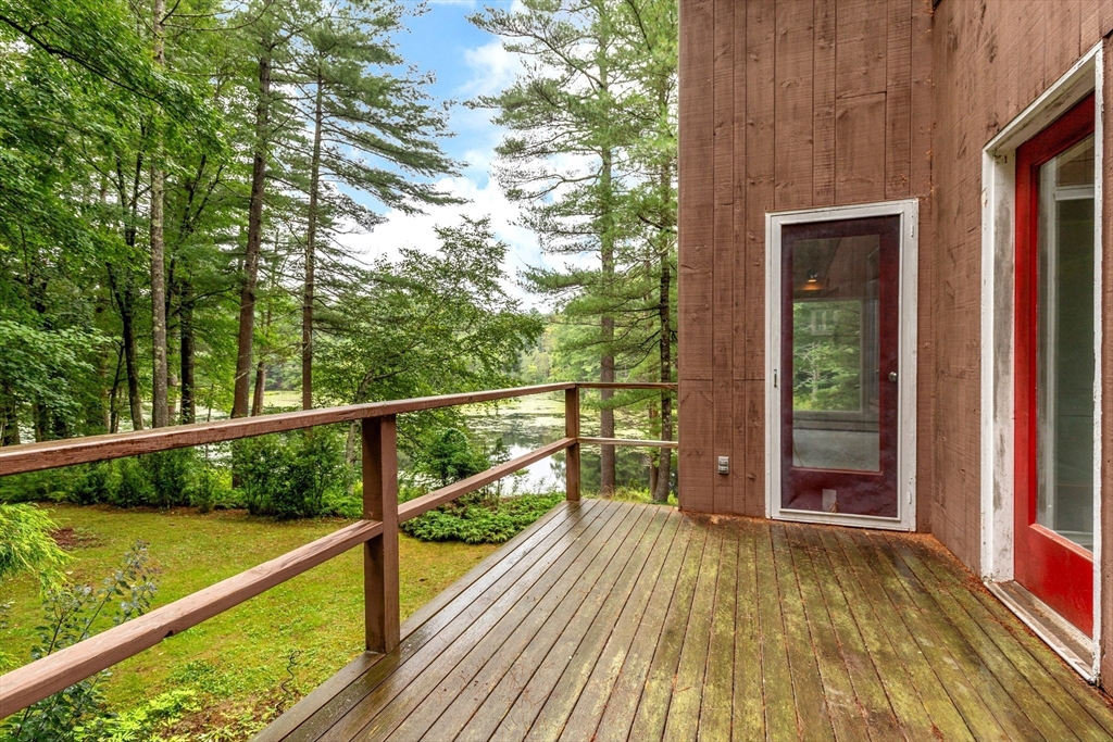 738 Lowell Road Groton, MA 01450 - Photo 24 of 30 a view of balcony with wooden floor