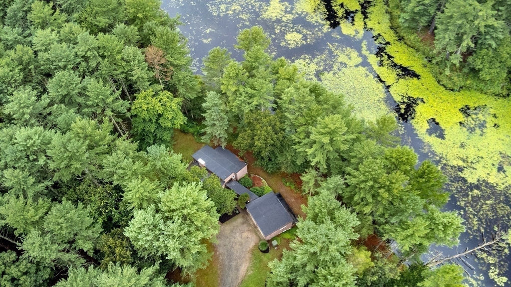 738 Lowell Road Groton, MA 01450 - Photo 27 of 30 a view of a house with a tree