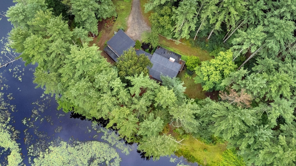 738 Lowell Road Groton, MA 01450 - Photo 28 of 30 an aerial view of a house with a yard