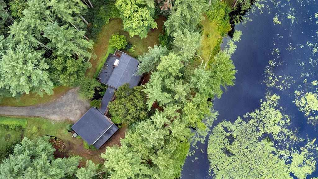 738 Lowell Road Groton, MA 01450 - Photo 29 of 30 an aerial view of a house with a yard